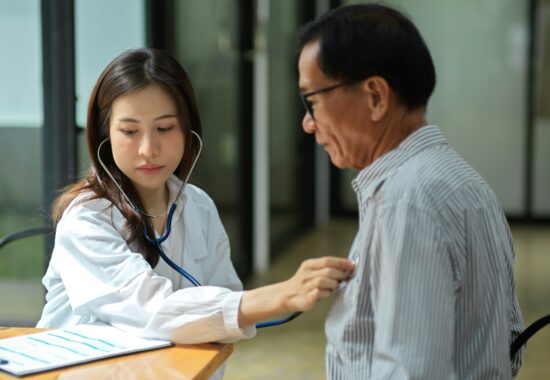 Doctor checking heart
